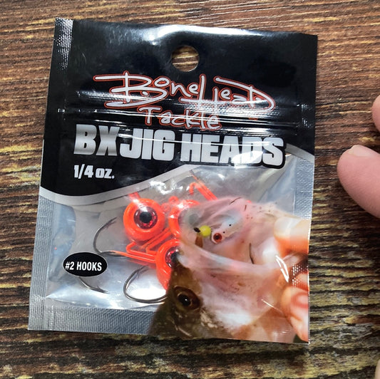 Bonehead Bladed jig heads orange